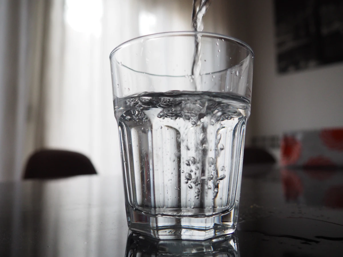 Clean water being poured into a glass