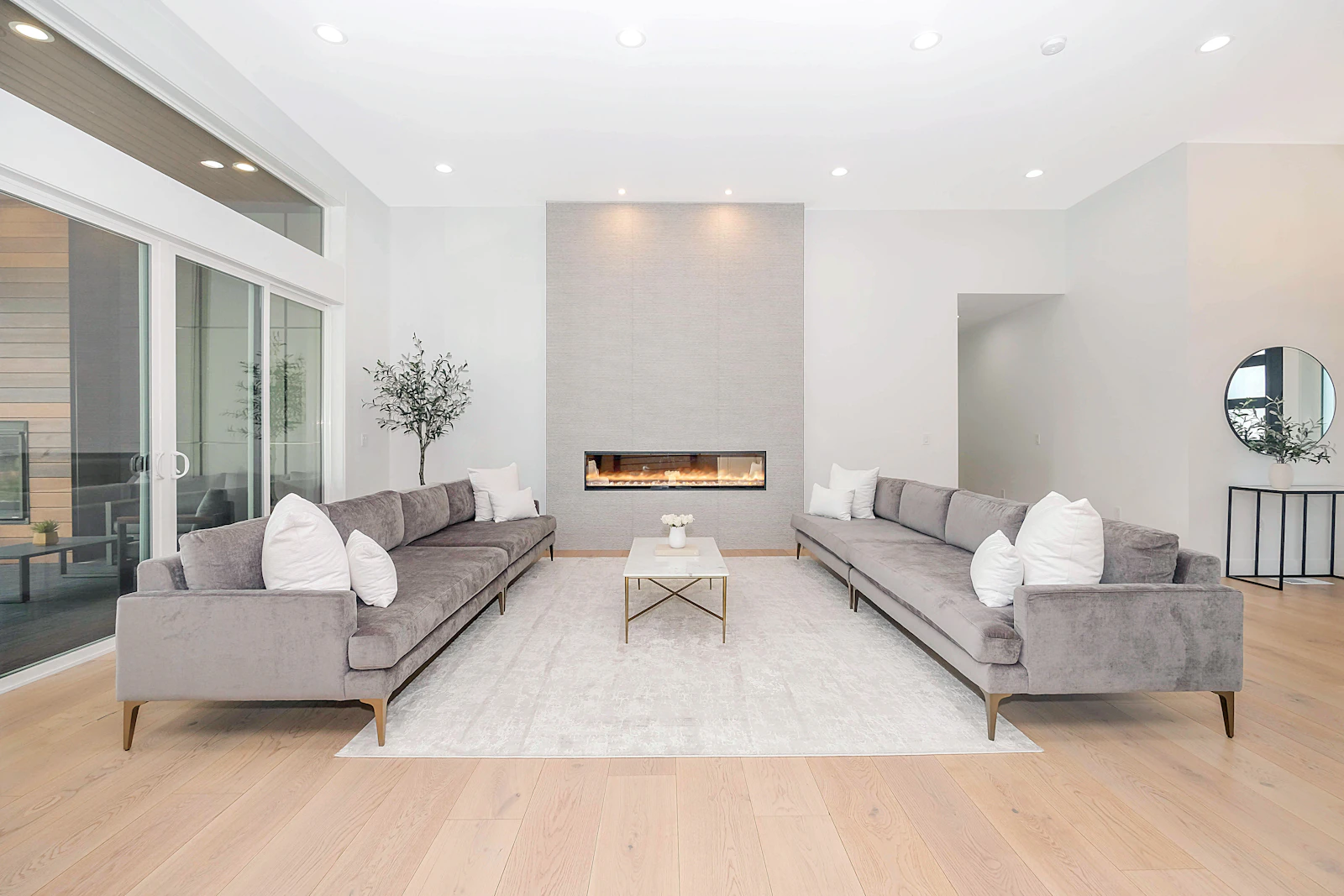 Bright, spotless modern living room with clean hardwood floors